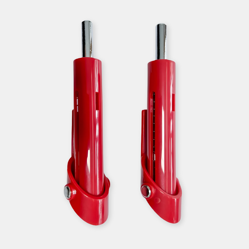 Two red metal components with chrome accents on a white background