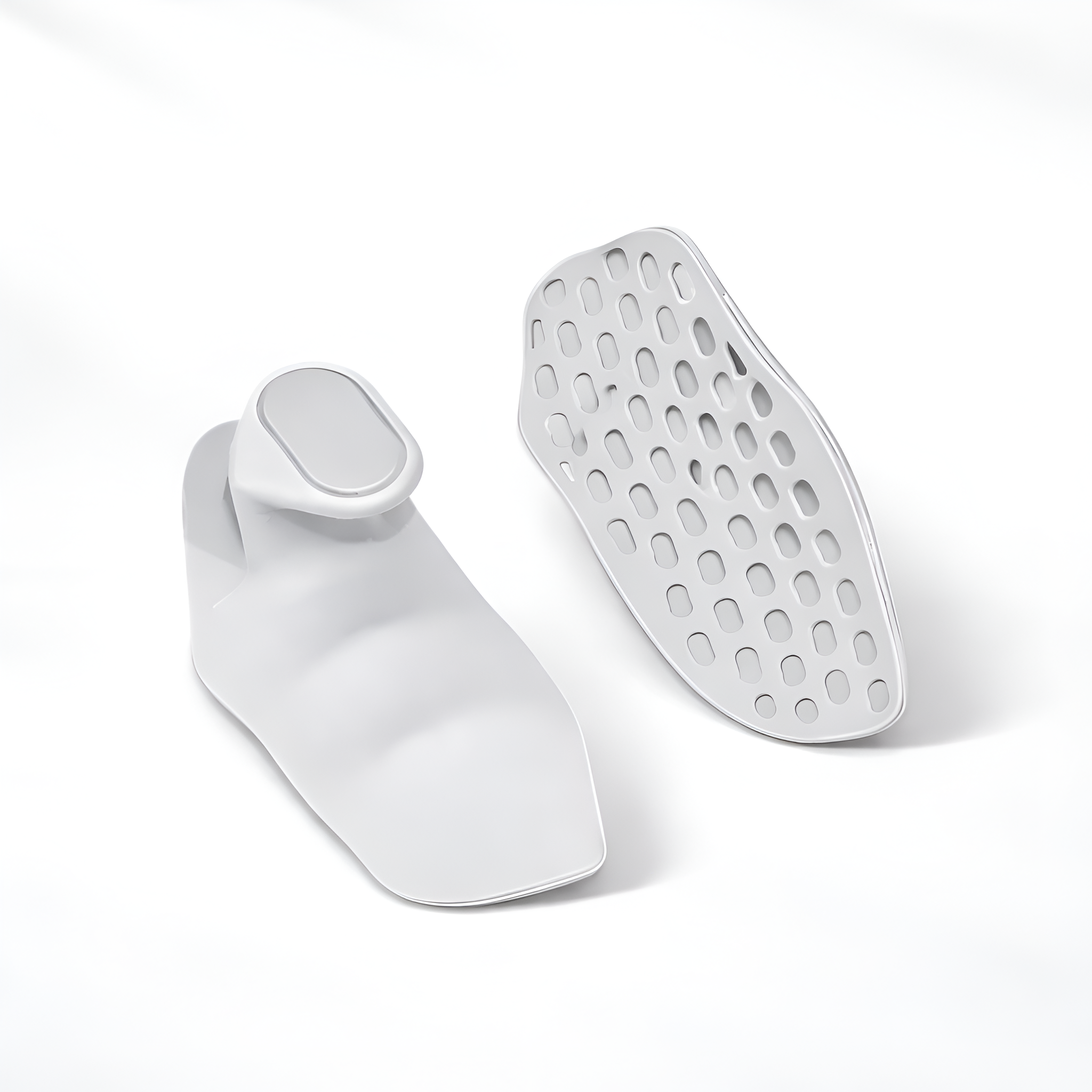 White shoe sole with textured design on a light gray background