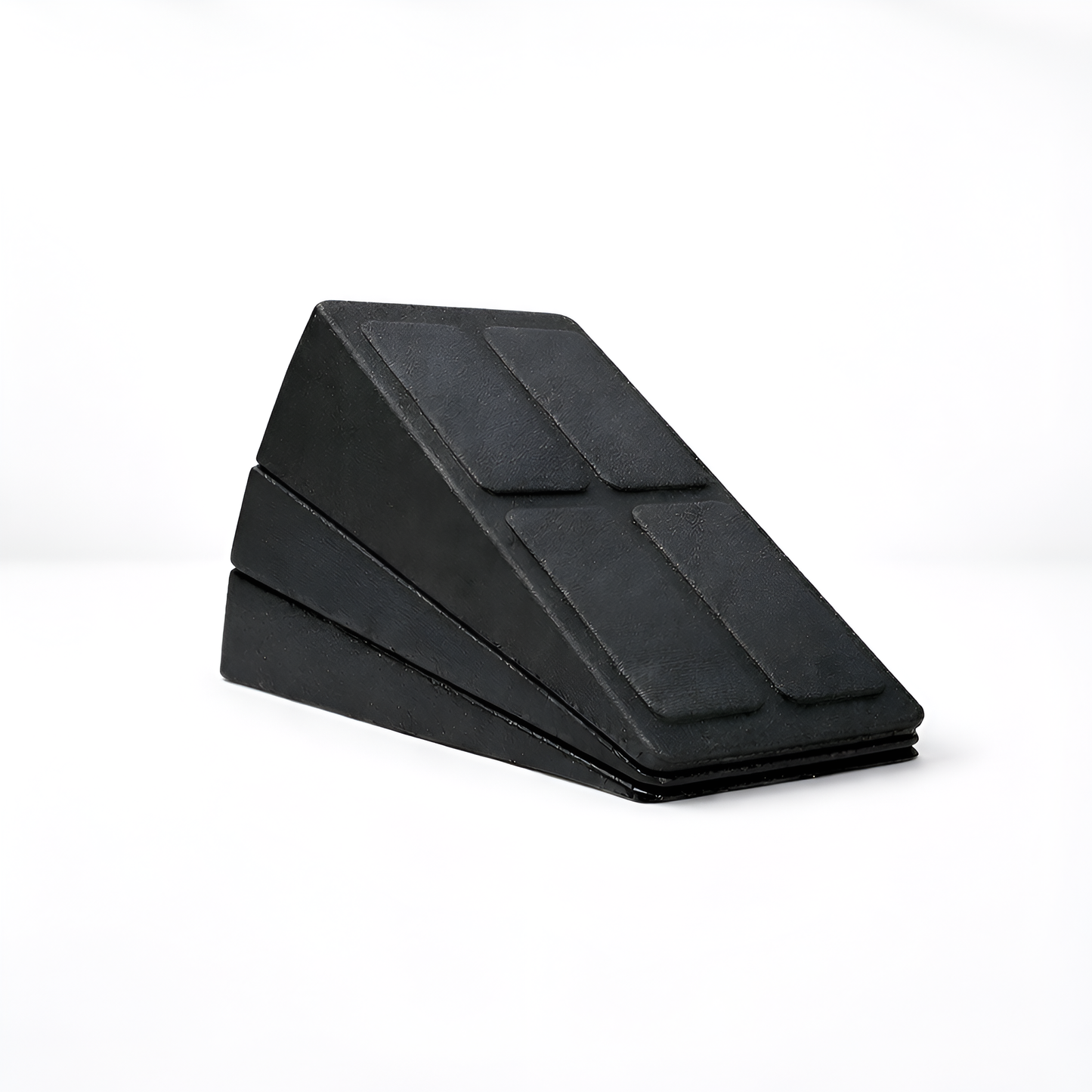 Black wedge-shaped foam roller on a white background