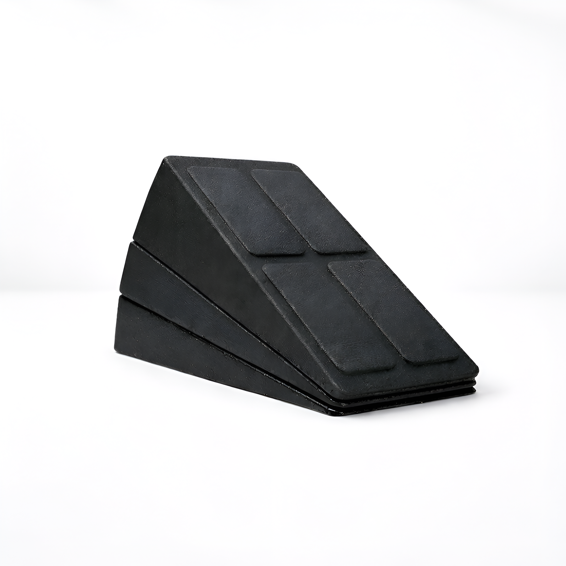 Black wedge-shaped foam roller on a white background