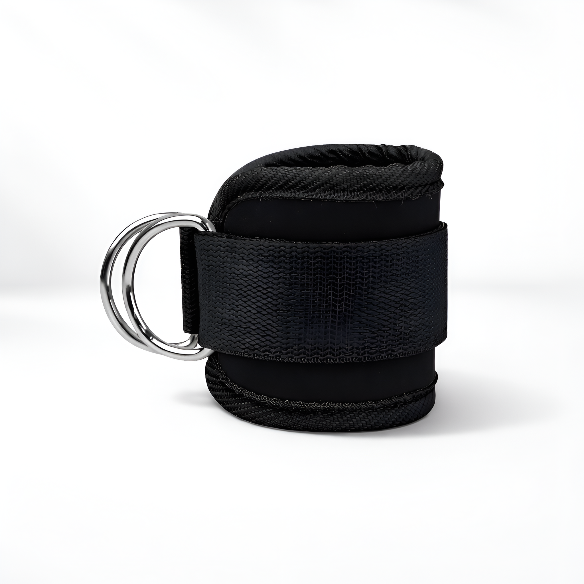 Black wrist cuff with a metal ring on a white background