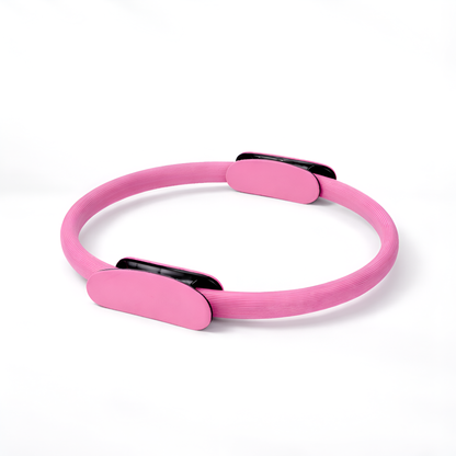 Pink Pilates ring on a white background