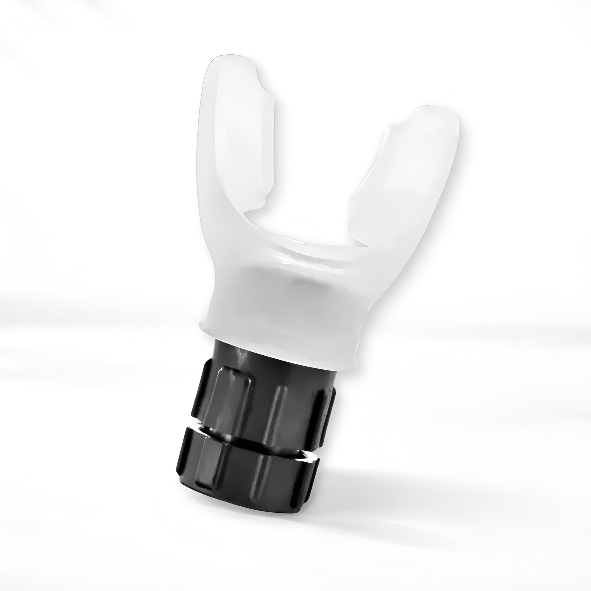 White plastic component with black fitting on a white background