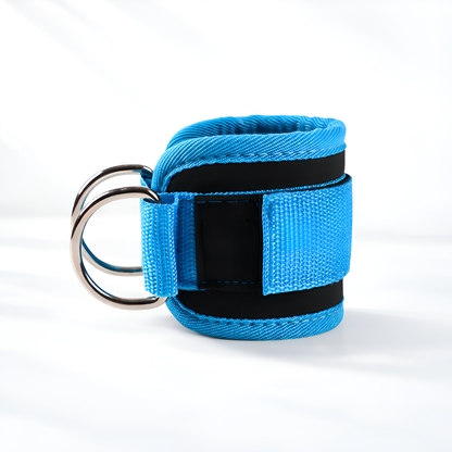 Blue wrist cuff with black straps and a metal ring on a white background