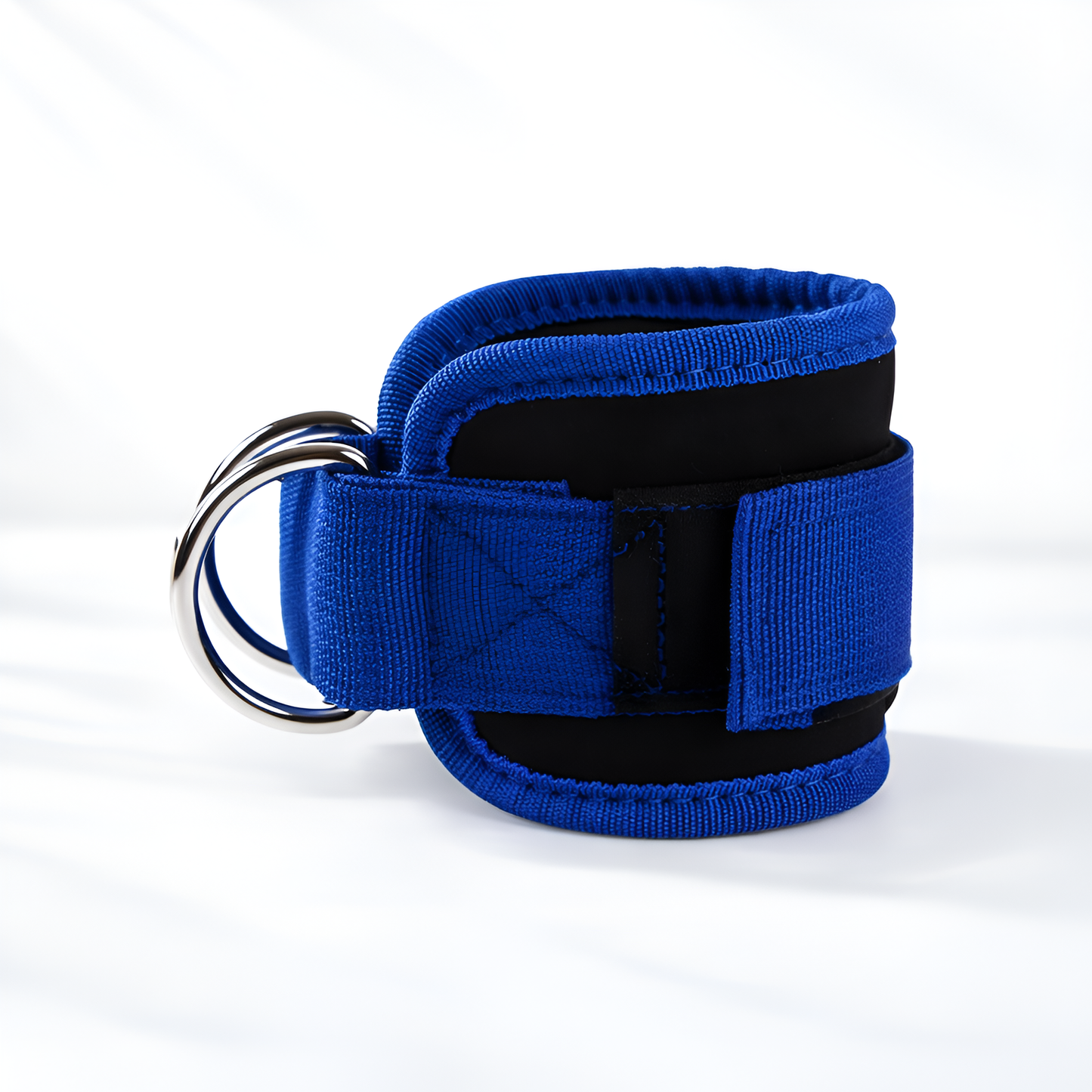 Blue wrist restraint with a metal ring on a white background
