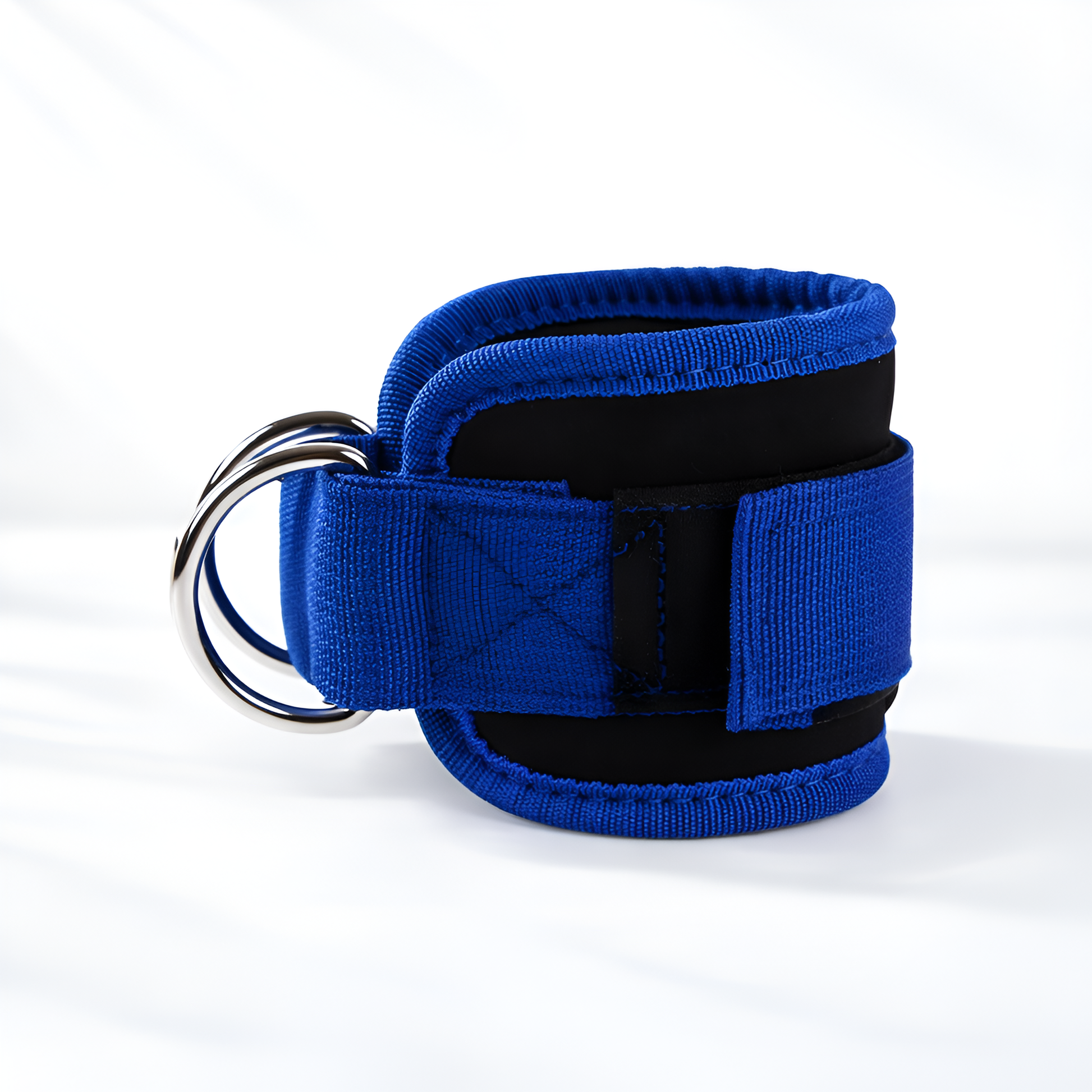 Blue wrist restraint with a metal ring on a white background