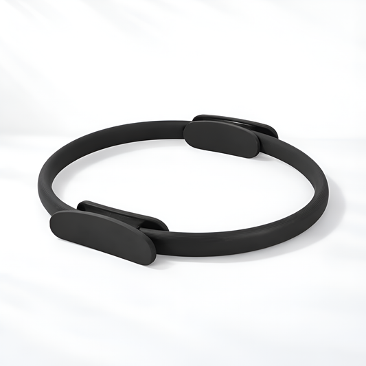 Black Pilates ring on a white background