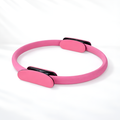 Pink yoga ring with black accents on a white background