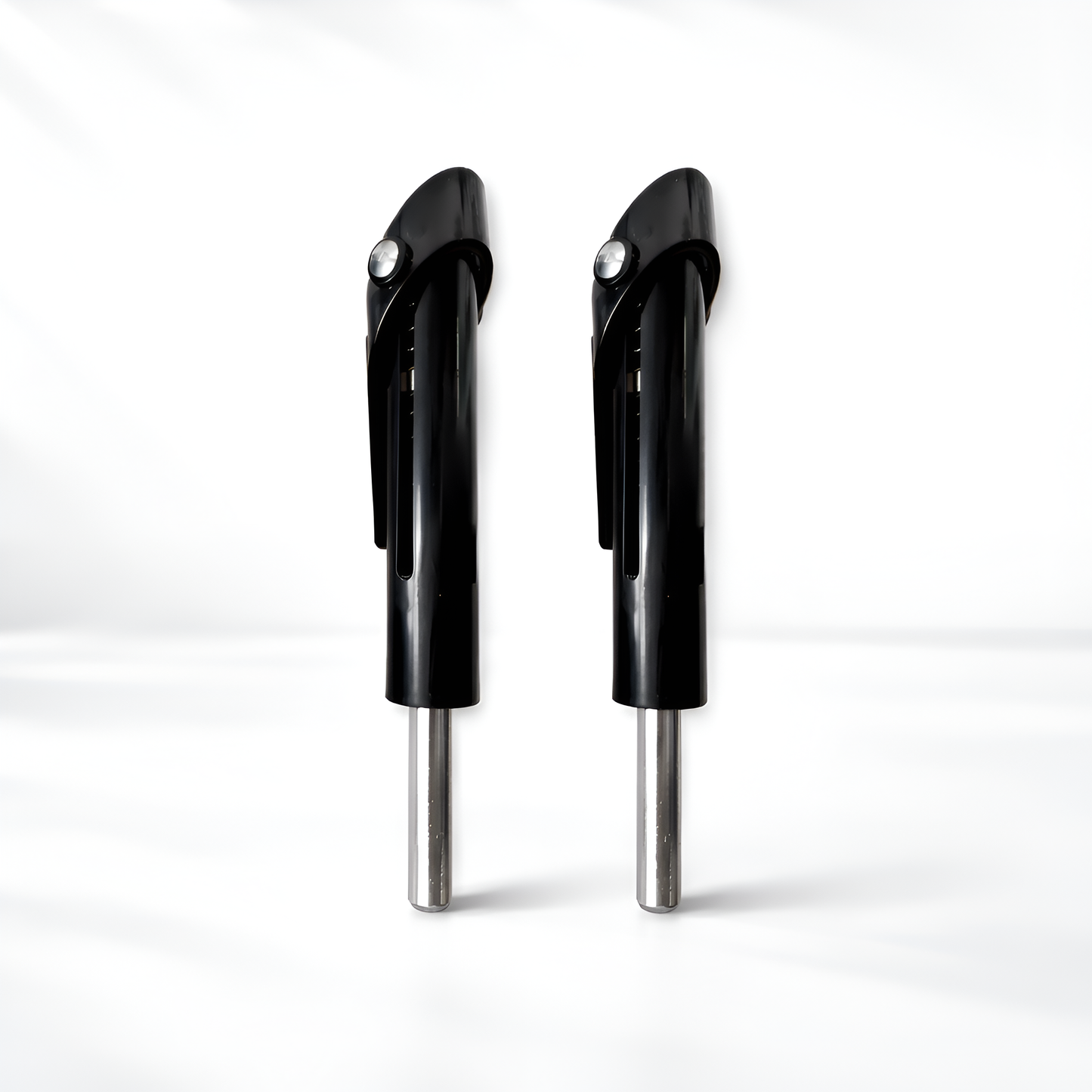 Pair of black and silver car side mirrors on a white background