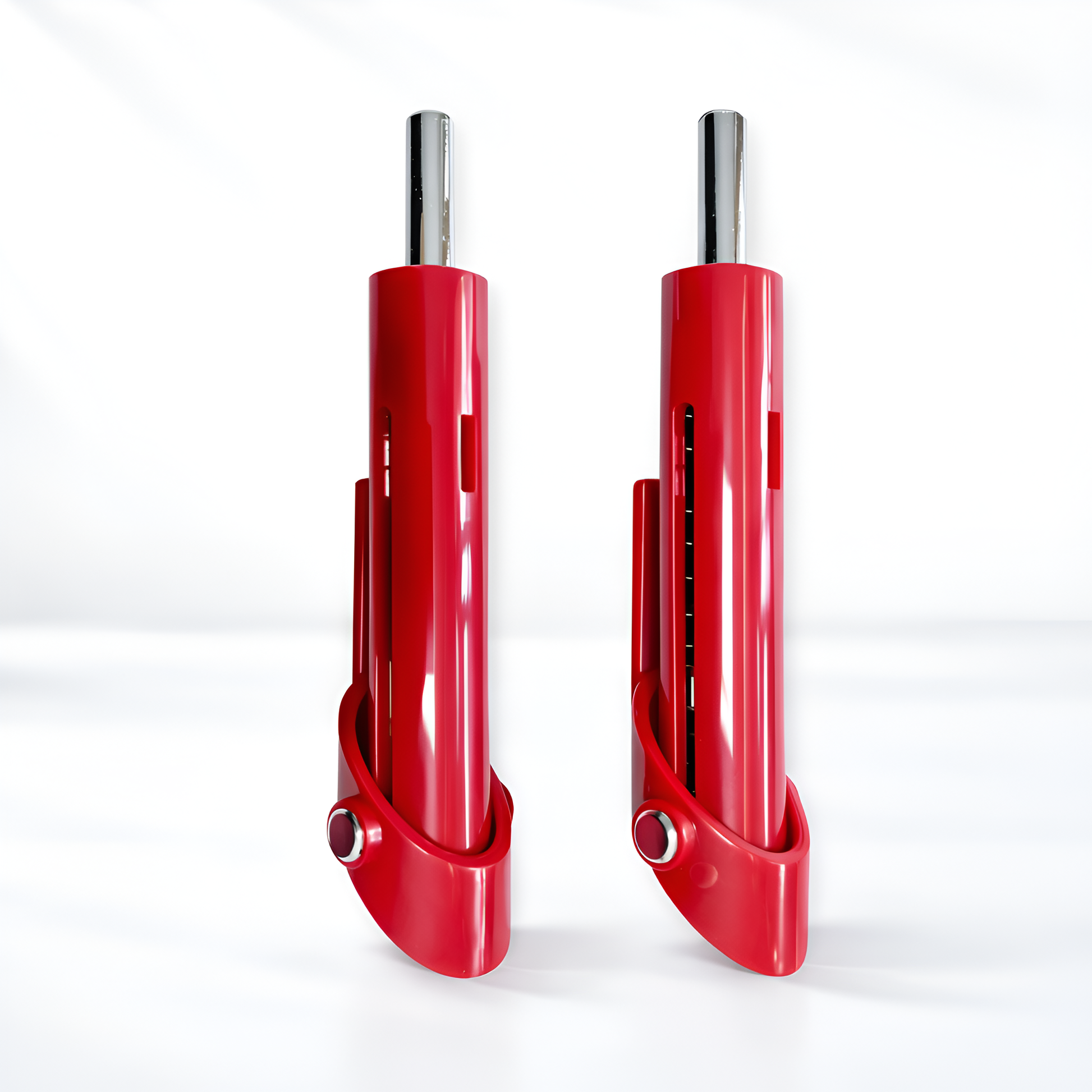 Two red metal components on a white background
