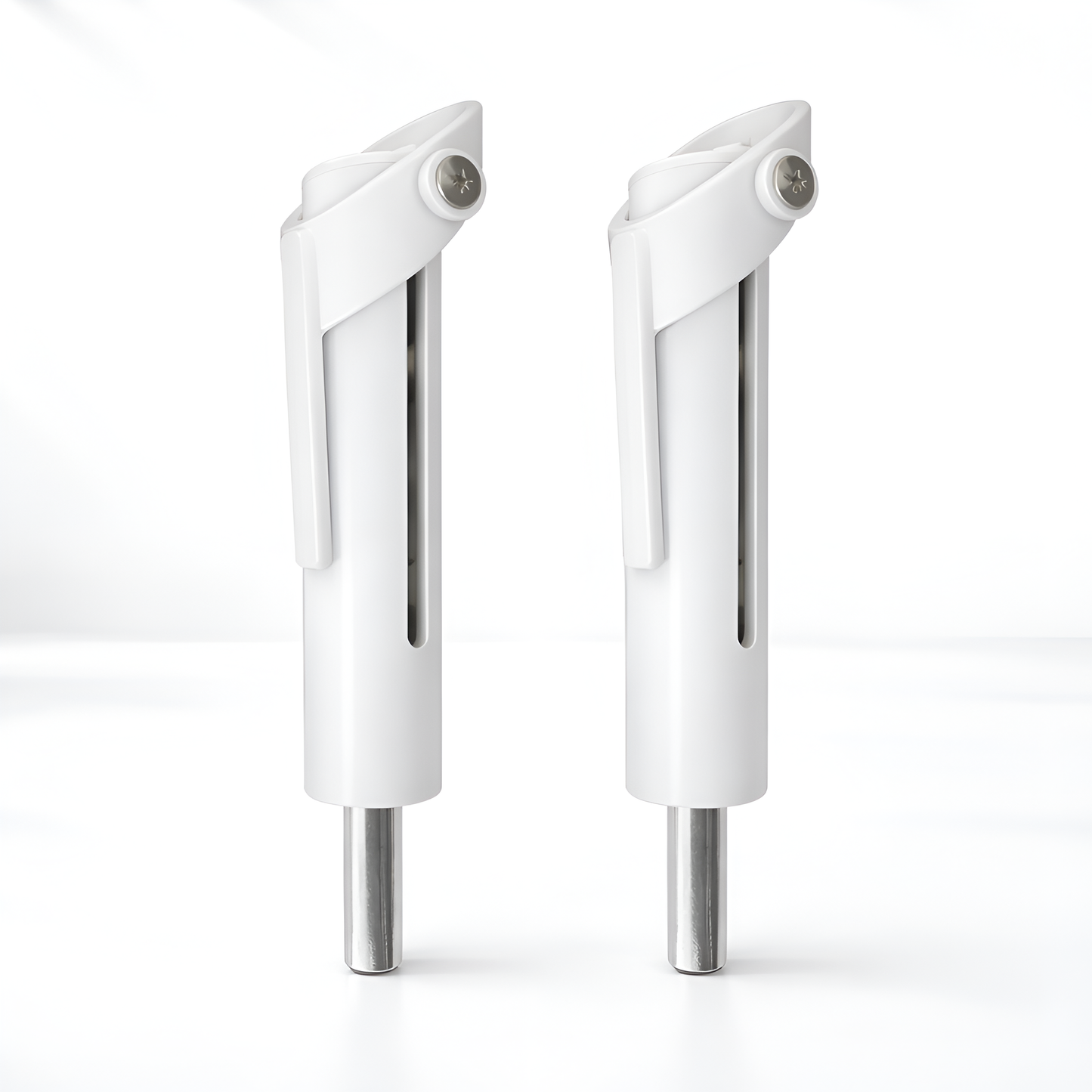 Two white and silver door handles on a white background