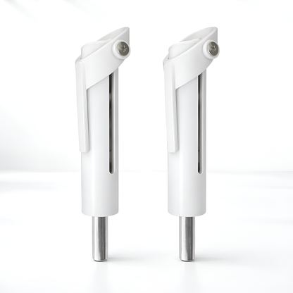 Two white and silver door handles on a white background