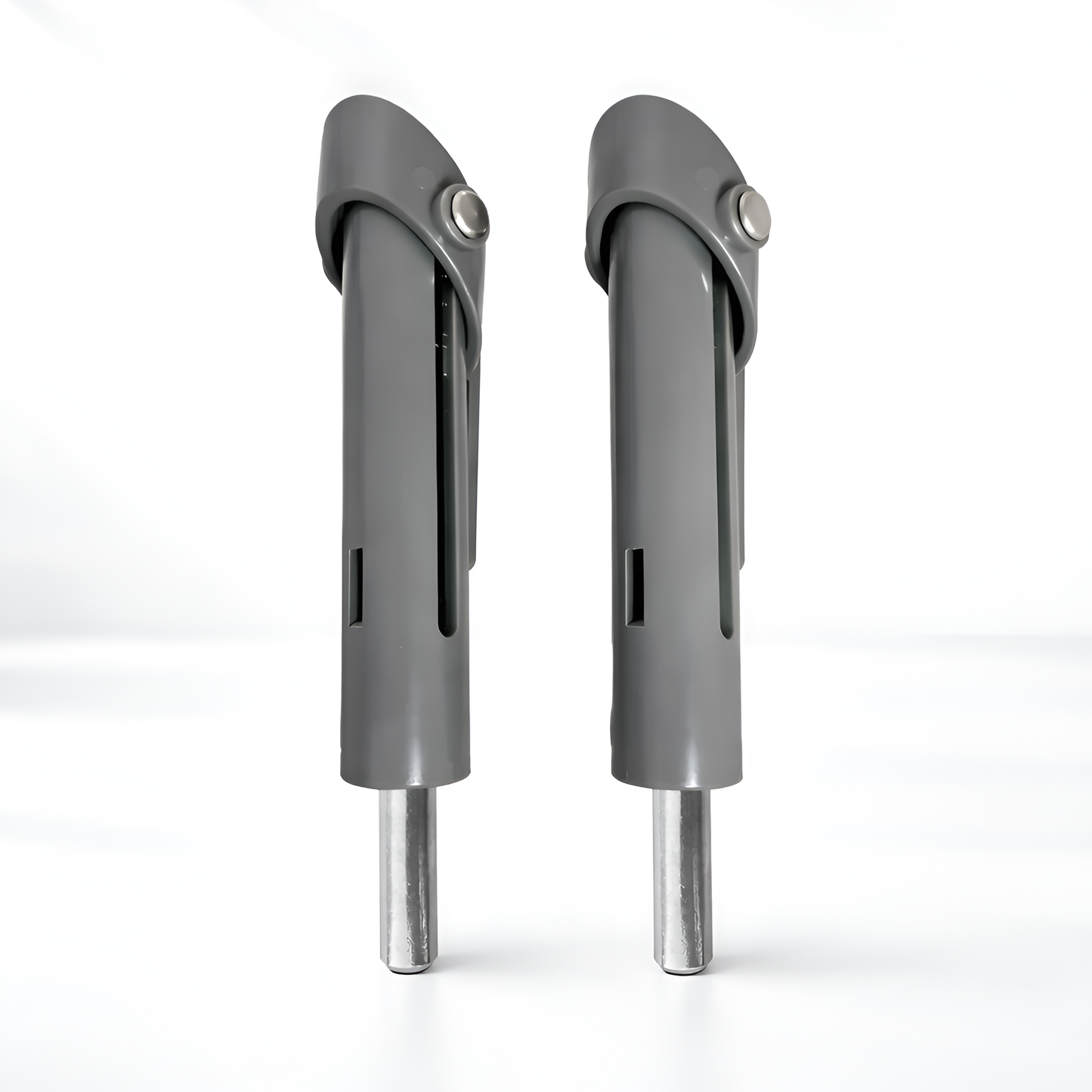 Two gray metal components on a white background