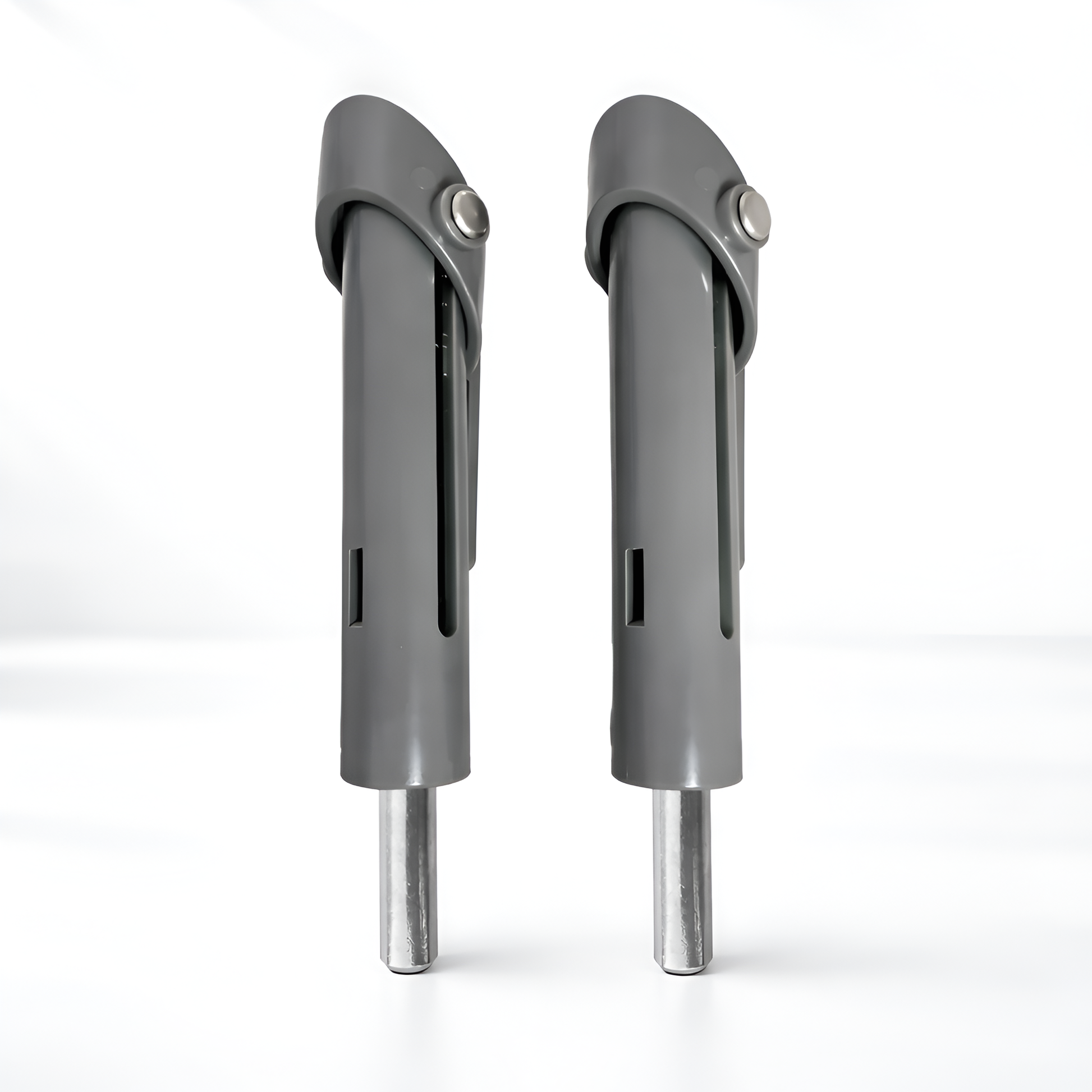 Two gray metal components on a white background
