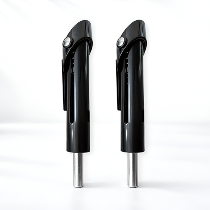 Two black and silver can openers on a white background