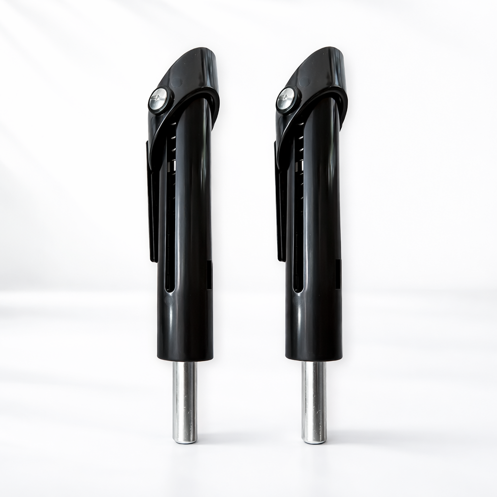 Two black and silver wine openers on a white background