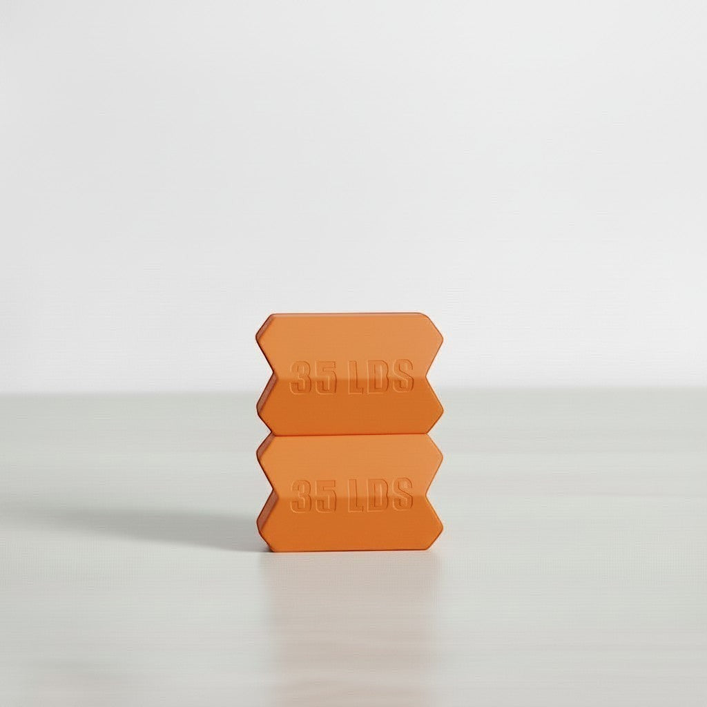 Dropset™ Official JawFlex 35 lbs weight plates stacked. Orange, hexagonal shape with embossed text.